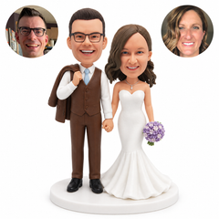 custom bobblehead figures wedding couple with the groom in a waistcoat and the bride in a strapless mermaid gown