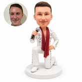 custom bobblehead figure stage singer kneeling in a white jumpsuit with a microphone