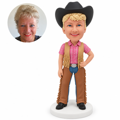 custom bobblehead figure cowgirl in a fringed vest and chaps over jeans