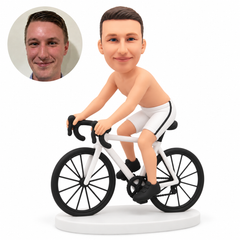 custom bobblehead figure shirtless male cyclist in white shorts riding a road bicycle