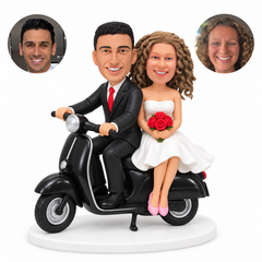 custom bobblehead figures wedding couple with a suited groom driving a scooter and the bride seated behind