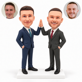 custom bobblehead figures two business partners in suits pressing their raised palms together