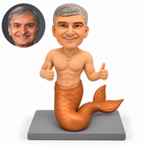 custom bobblehead figure merman giving two thumbs-up with a curled fish tail