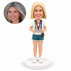 custom bobblehead figure female running winner holding her medals with both hands
