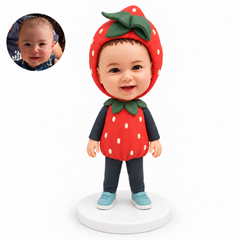 custom bobblehead figure toddler boy in a strawberry costume with both arms down