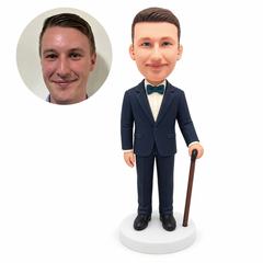 custom bobblehead figure gentleman holding a walking cane with one arm at his side