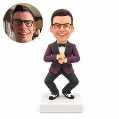 custom bobblehead figure man in a tuxedo performing a crossed-wrist dance pose