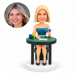 custom bobblehead figure female poker player in a strapless dress seated at a table with cards and chips