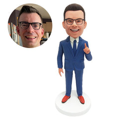 customised bobble head figure male boss president finger pointed upward.
