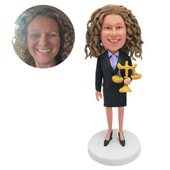 custom bobble head figure female lawyer business woman holding a libra
