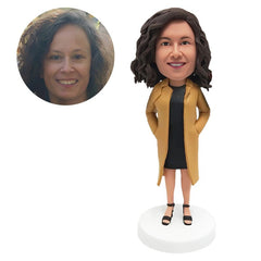 personalised bobble head figure office lady long coat with hands in pockets