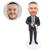 custom bobblehead figure salesman holding a point of sale machine