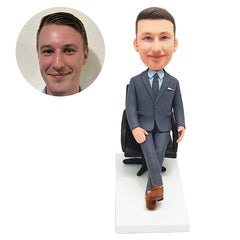 personalized bobblehead salesman businessman boss sits on an office chair