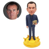 custom bobblehead figure boss holding money on a crown base
