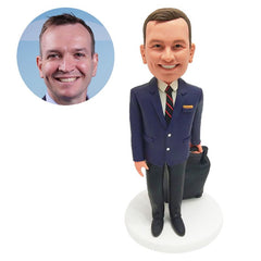 customized bobble head flight attendants carrying a suitcase