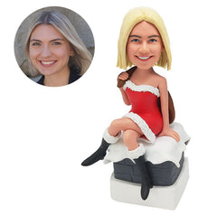 personalised bobblehead figure sexy Christmas Santa lady holding a brown bag