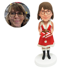 personalized bobblehead figure Christmas Santa lady holding a gift