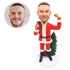 personalized bobblehead figure Christmas Santa holding a bag