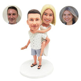 custom bobbleheads figures couple carrying lady on the back