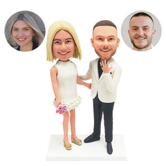 customized engagement bobble heads figures wedding couple showing wedding band
