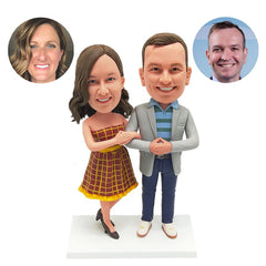 customised bobble heads figures couple arm in arm