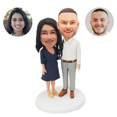 personalised bobble heads figures lovers couple with arms around each other