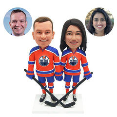 personalised bobbleheads figures hockey fans couple holding hockey sticks