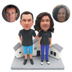 customized bobbleheads figures couples in front of houses