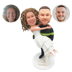 customized bobble head figure couple firefighter is holding his wife