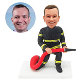 customised bobblehead figure fireman fire fighter holding a water pipe