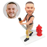 customised bobble head figure fireman fire fighter holding a water pipe