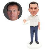 customised bobblehead figure pilot holding a plane model
