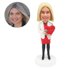 customised bobblehead psychologist holding a red heart with a stethoscope