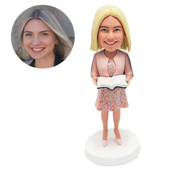 customized bobblehead figure female teacher holding a book
