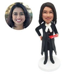 personalised bobblehead figure lawyer holding a book with one hand on the hip