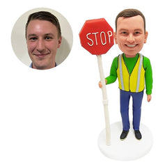 personalised bobblehead figure construction male worker holding a standing in hi vis workwear