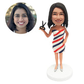 personalized bobblehead figure barber holding a scissors in striped dress