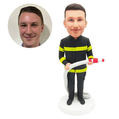 personalized bobble head figure fireman fire fighter holding a water pipe