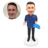 personalized bobblehead figure male surgery doctor holding a cup of coffee