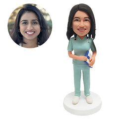 custom bobble head figure female doctor holding a noteboard with a stethoscope