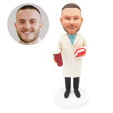 customised bobblehead figure male doctor holding a book and a drink