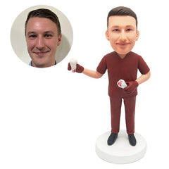 customized bobblehead figure male doctor holding models of teeth