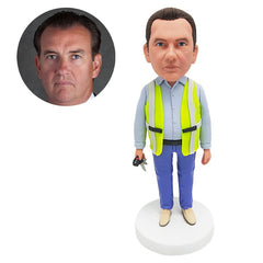 customised bobblehead figure worker holding a set of keys