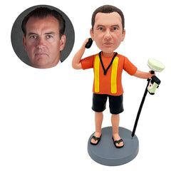 customised bobblehead explorer worker holding a detecting instrument