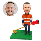 personalised bobble head figure male worker holding a weeding machine