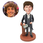 custom bobble head figurine lawyer holding a paper