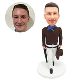 custom bobblehead figure cowboy holding a hat