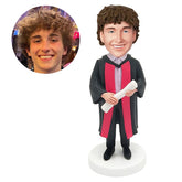 customised graduation bobblehead figure male graduate holding a diploma