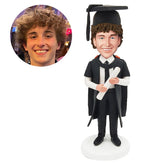 customized graduation bobble head figure male graduate holding a certificate