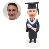 customized bobblehead figurine graduate holding a certificate
